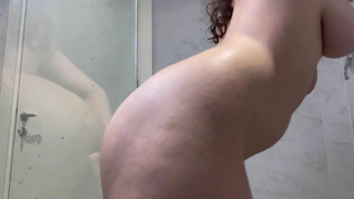 Curly Baby Xoxo Having Fun With Her Dildo In The Shower